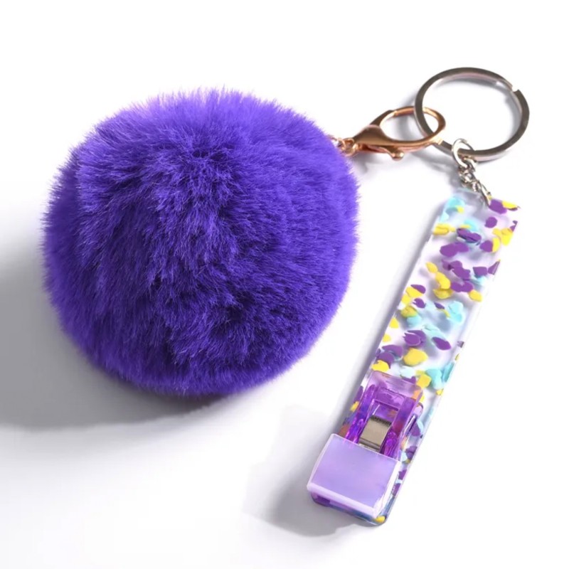 Porte clés avec tire carte et pompon